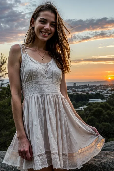 arafed woman in a white dress standing on a rock with a sunset in the background